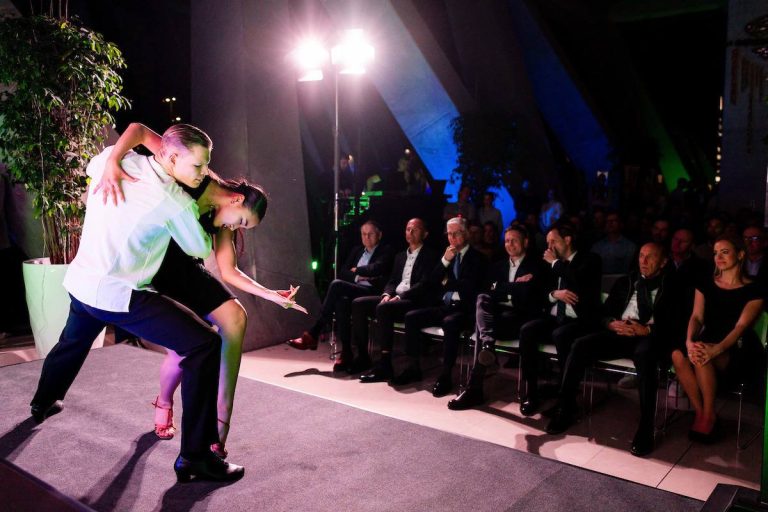 Dancers performing in front of an audience