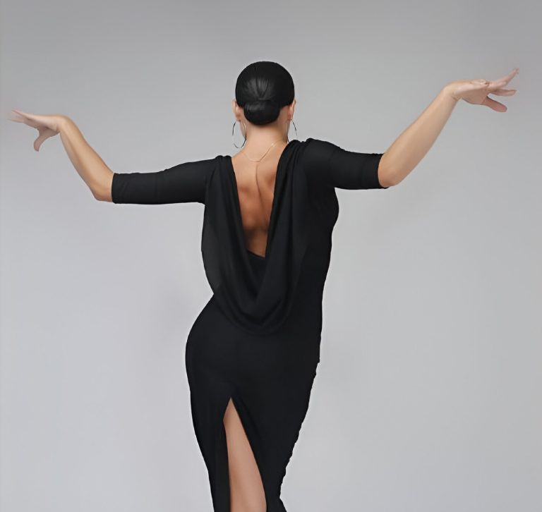 A solo Latin dancer in a black dress